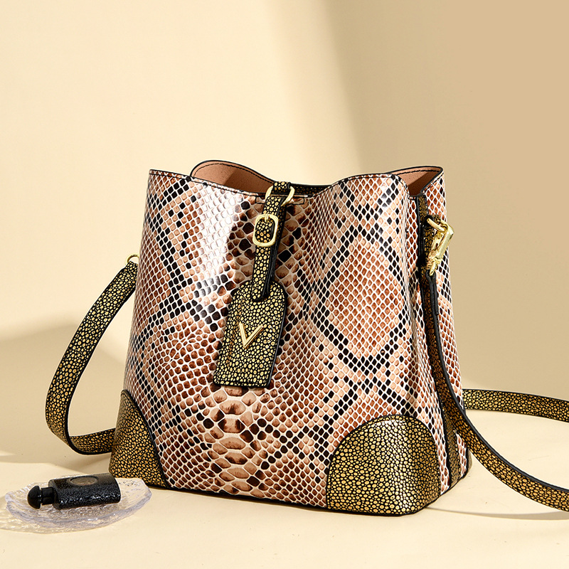 Luxury Bags To Sell - Somenie 売れ筋プレミアムテクスチャースネークパターンバケットバッグ女性用 2026 新しいライトラグジュアリーニッチポータブルショルダーメッセンジャーバッグ
